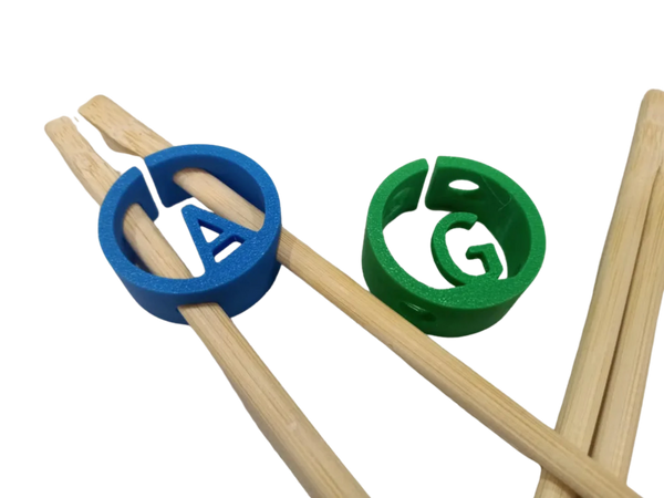 Chopstick gripper / holder with optional letter