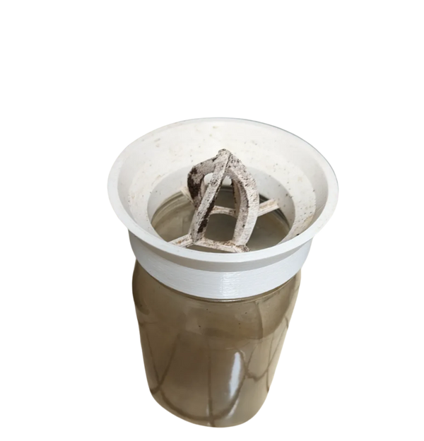Keurig coffee extractor with built in lid