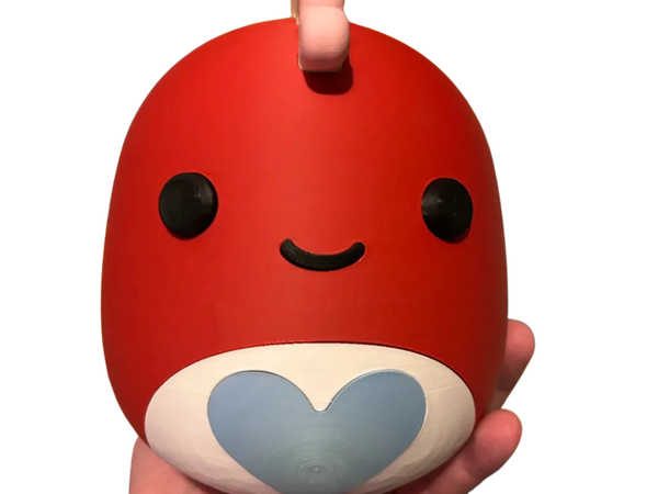 Squishmallow Dino with Hearts on spine