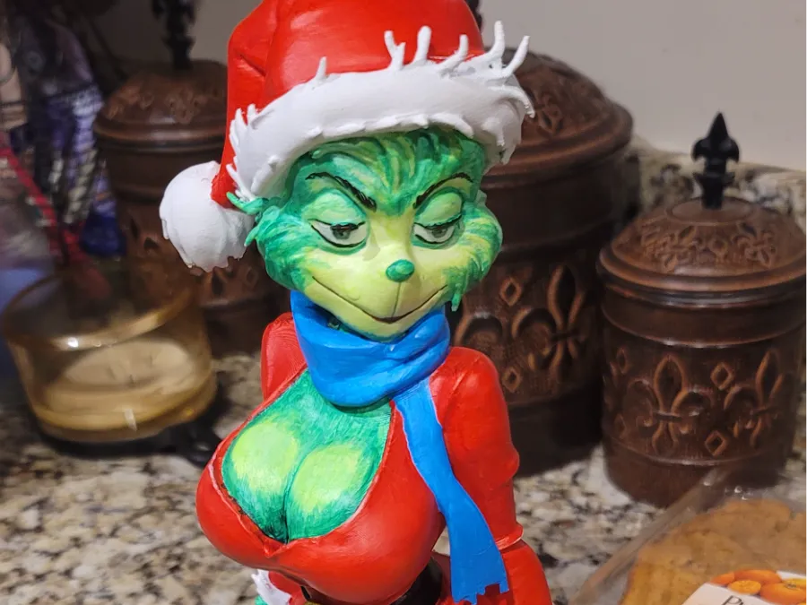 Female Grinch in Boots